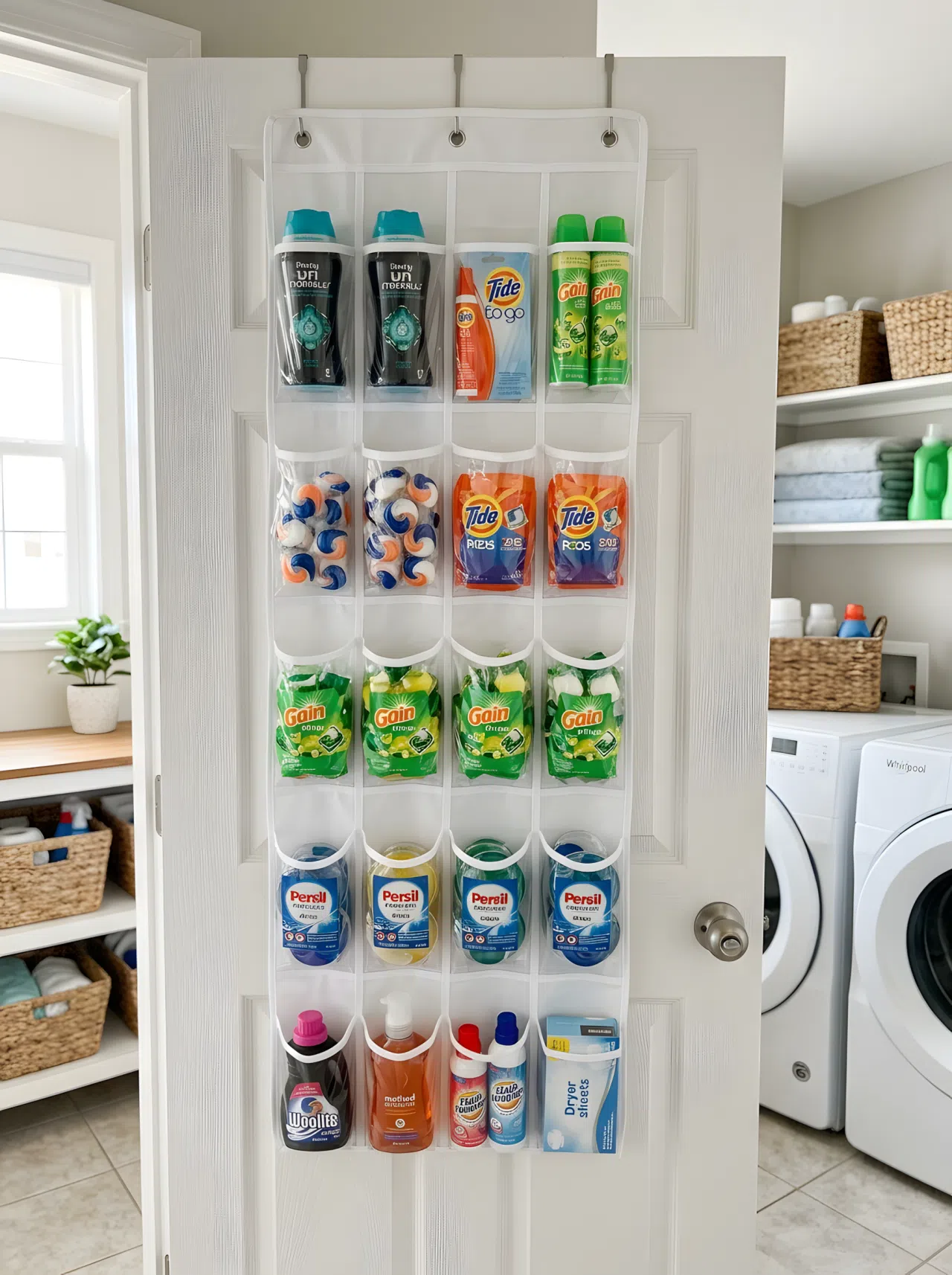 An over-the-door organizer on the back of a laundry room door, holding neatly arranged detergent pods and small bottles, bright natural light, organized and clean, realistic photography
